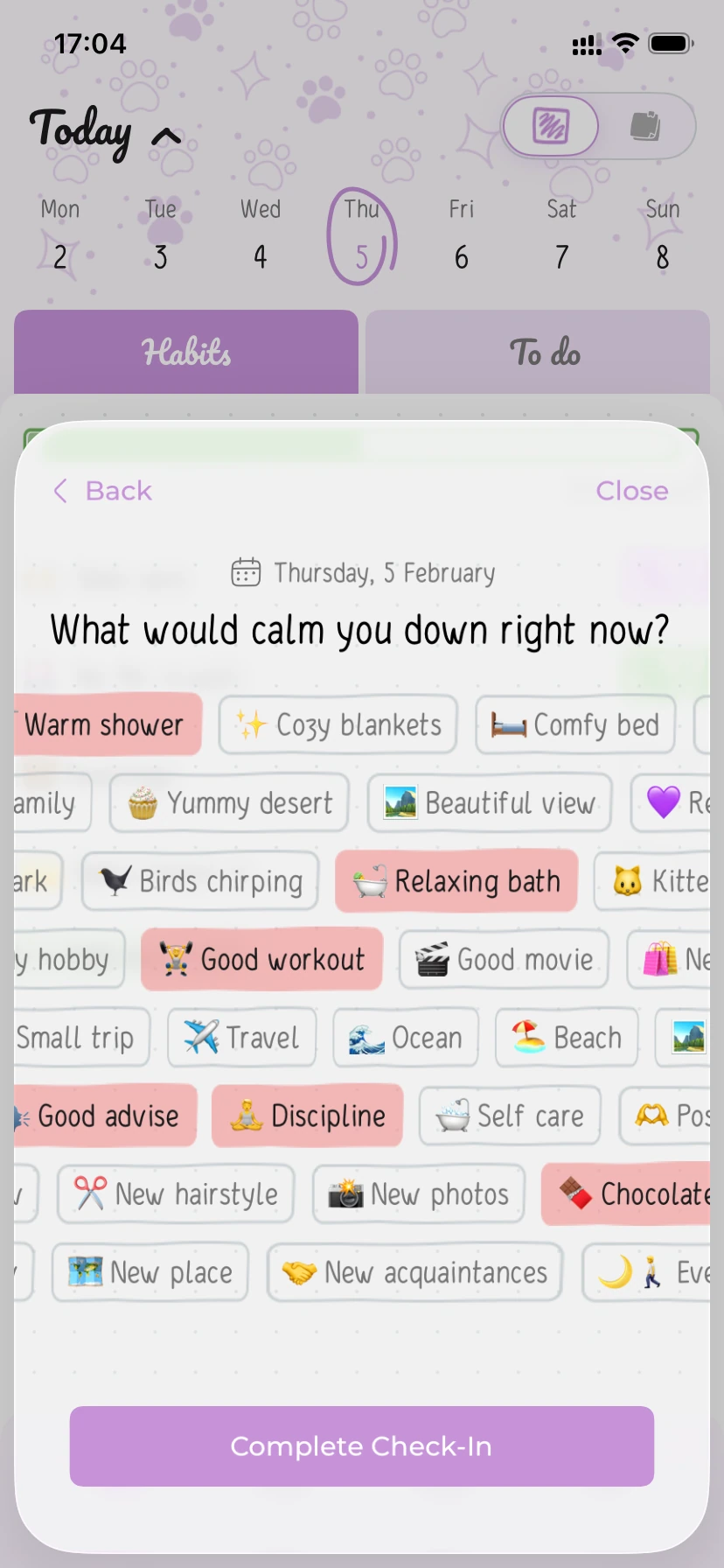 Hizo calming prompt screen asking “What would help you calm down right now?” with selectable idea tags and a Finish Daily Check-in button.
